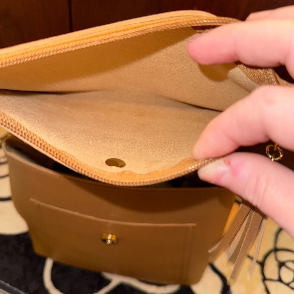 GORGEOUS CAMEL COLOR MINI BACKPACK WITH CONVERTIBLE STRAPS AND ACCENT TASSELS